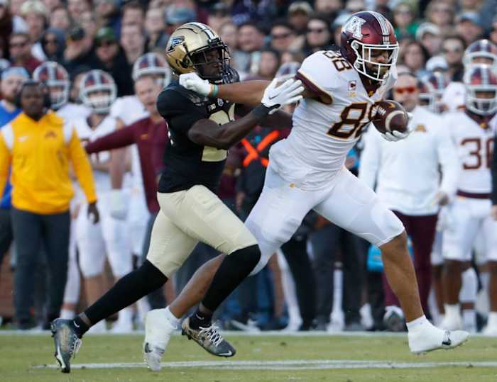 Minnesota Golden Gophers tight end Brevyn Spann-Ford (88) stiff-arms Purdue Boilermakers defensive back Sanoussi Kane (21) during the NCAA football game, Saturday, Nov. 11, 2023, at Ross-Ade Stadium in West Lafayette, Ind. Purdue Boilermakers won 49-30.  